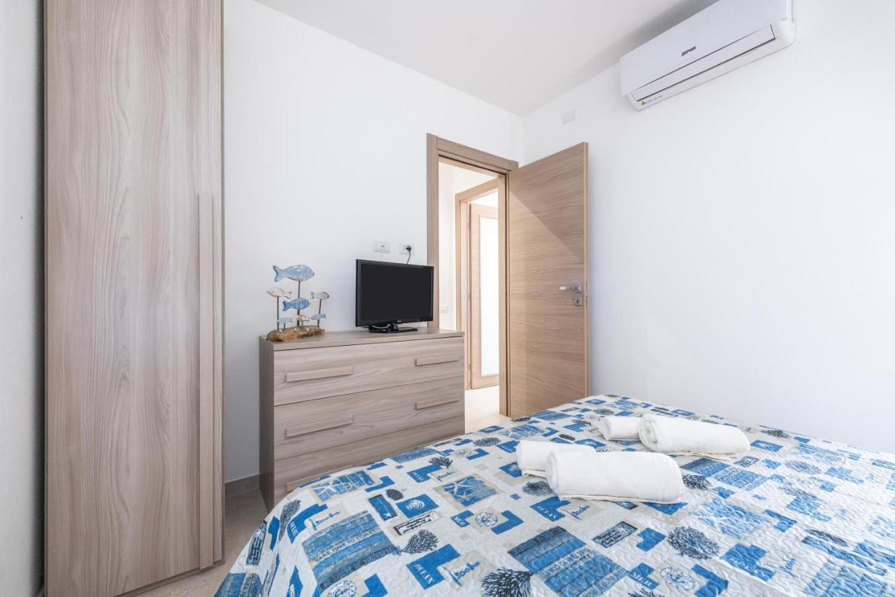 Casa Vacanza Porto Luna ヴィッラシミーウス エクステリア 写真