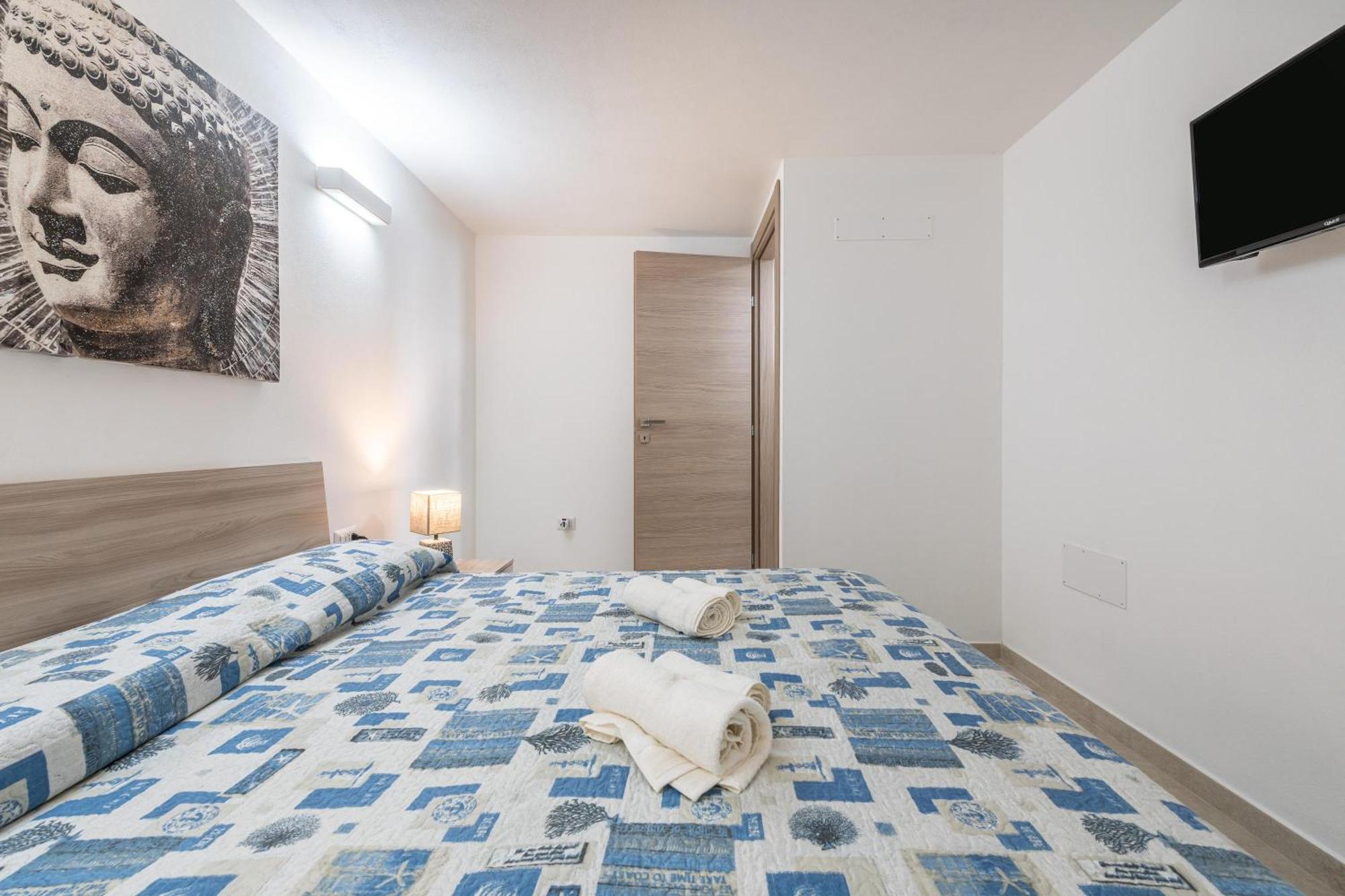 Casa Vacanza Porto Luna ヴィッラシミーウス エクステリア 写真
